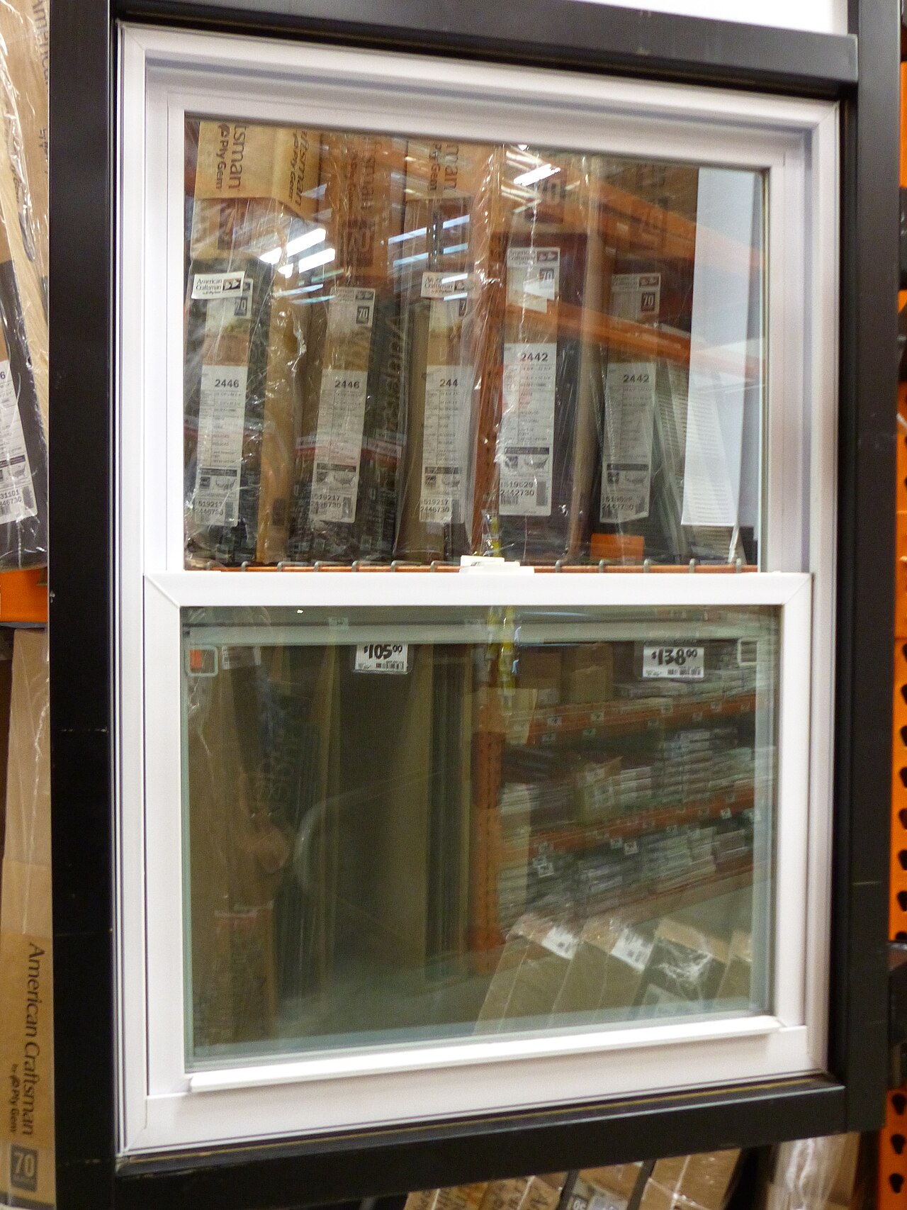 White vinyl double-hung replacement window display